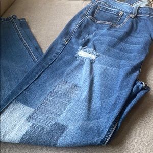 Kensie distresses jeans.